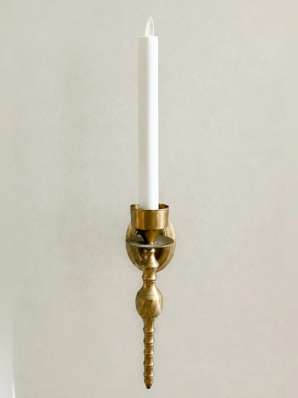Wall brass candlestick holder